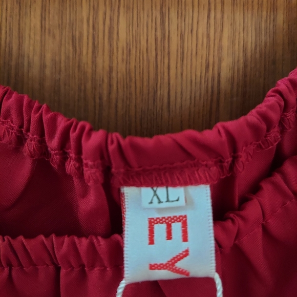 Red cocktail dress with cut out accents - Picture 3 of 3